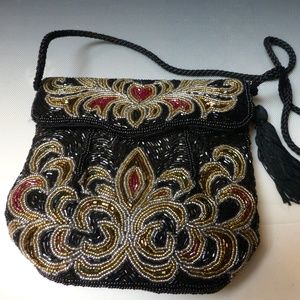 Bling evening beaded bag  tassel all around beads